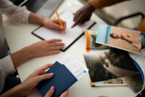 close-up-hand-signing-document-with-pencil_23-2149080815